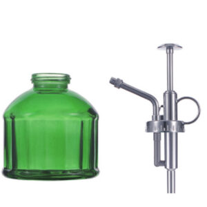 Green glass jar (240ml) paired with electroplated plastic spray pump—ideal for premium garden misting, household disinfection.